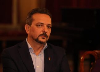 „Pericolul unor partide ca AUR este cu atât mai mare cu cât vine pe fondul nostalgiei românilor după un tătuc”. Interviu cu Daniel Șandru, președintele IICCMER